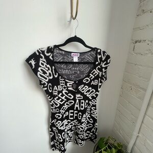 Never worn: Maximalist Alphabet Print Button Detail Romper